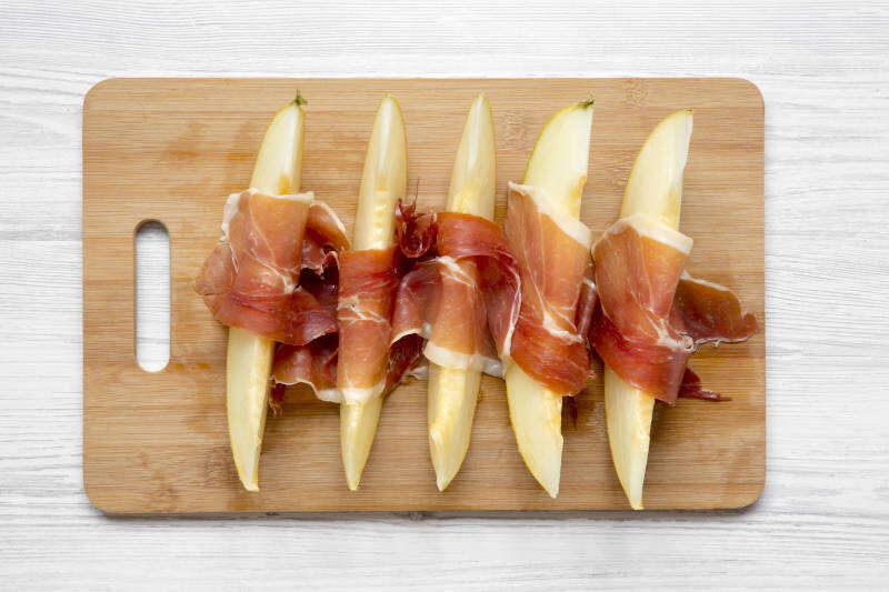Un tagliere di Prosciutto e Melone Bianco Un tagliere di Prosciutto e Melone Bianco